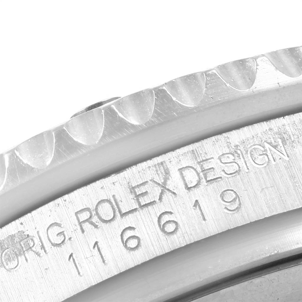 This close-up image shows part of the bezel and engraved case side of the Rolex Submariner 116619BLSO Men's White Gold Blue Dial 116619BLSO Men's White Gold Blue Dial model.