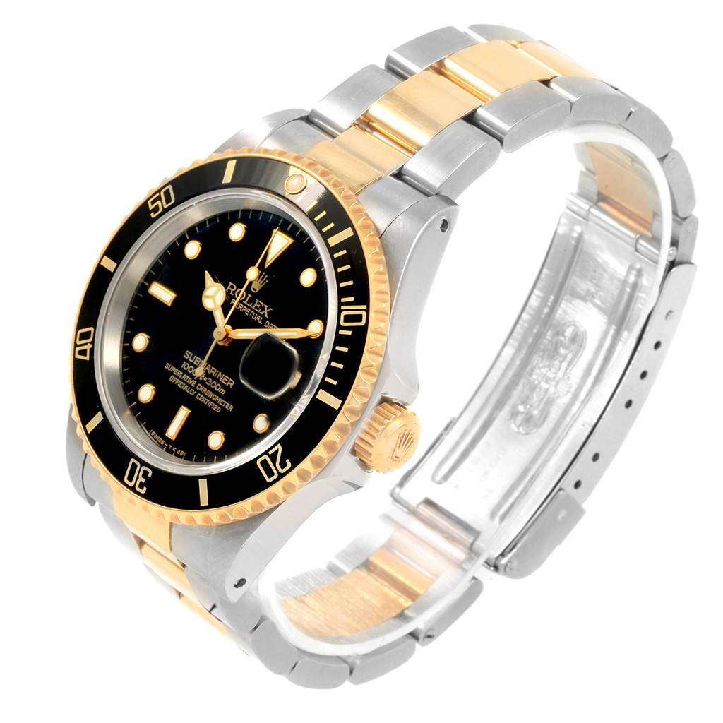 This image shows a Rolex Submariner 16613 Men's Steel and Gold (two tone) Black Dial 16613 Men's Steel and Gold (two tone) Black Dial watch from an oblique angle, highlighting the bezel, dial, crown, and two-tone bracelet.