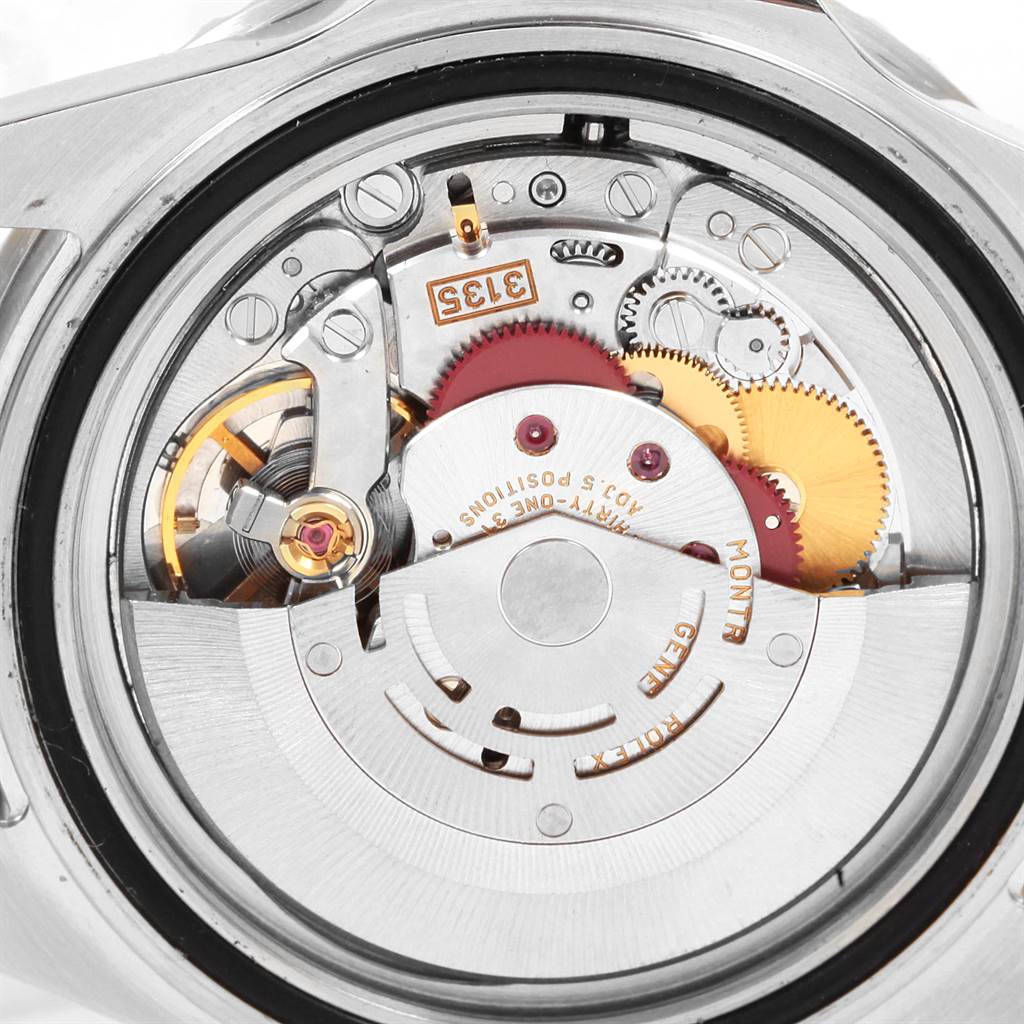 This image shows the internal mechanical movement of a Rolex Submariner 16613 Men's Steel and Gold (two tone) Blue Dial 16613 Men's Steel and Gold (two tone) Blue Dial watch from a back angle.