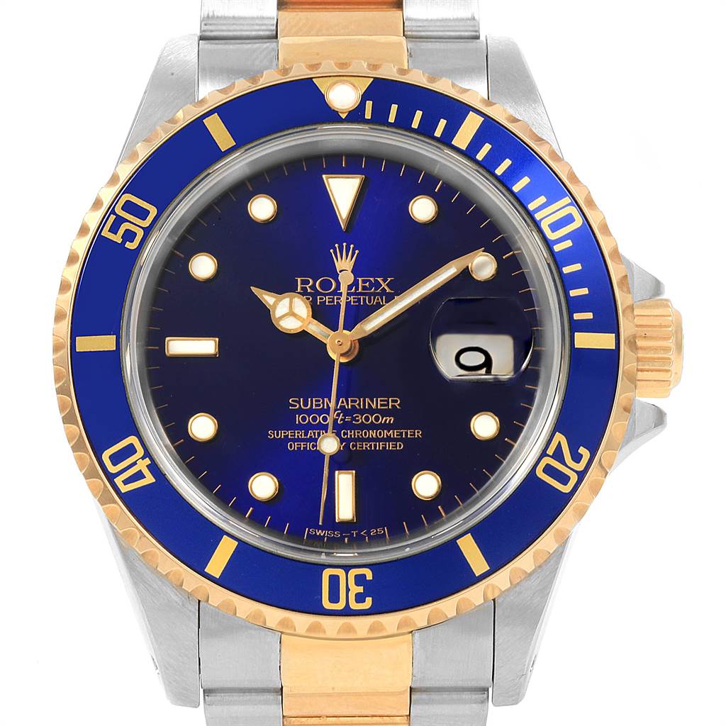 Close-up view of the Rolex Submariner 16613 Men's Steel and Gold (two tone) Blue Dial 16613 Men's Steel and Gold (two tone) Blue Dial watch showing the dial, bezel, crown, and part of the bracelet.
