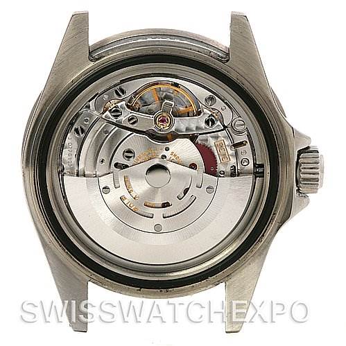 This image shows the back view of a Rolex Submariner 16610V Men's Stainless Steel Black Dial 16610V Men's Stainless Steel Black Dial watch, exposing its internal mechanical movement.