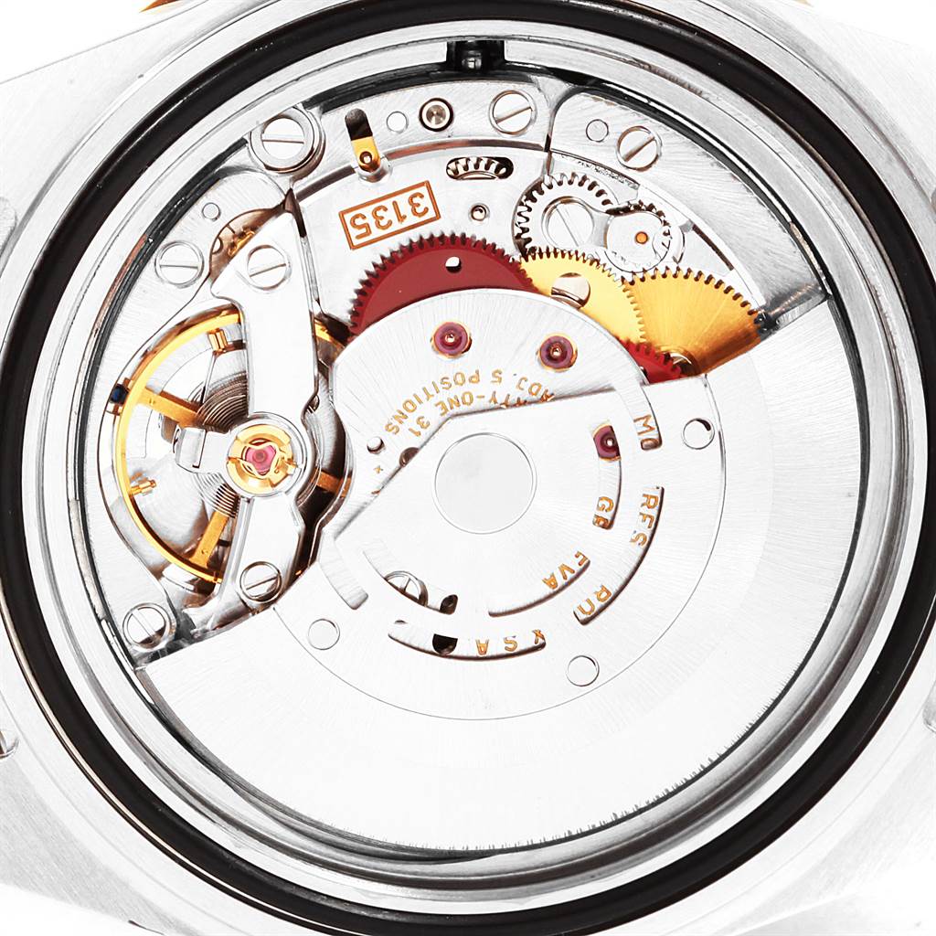 This image shows the internal mechanism of the Rolex Submariner 16613 Men's Steel and Gold (two tone) Blue Dial 16613 Men's Steel and Gold (two tone) Blue Dial watch from a back angle.