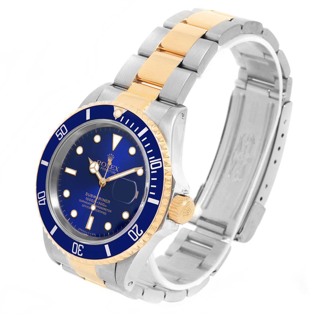 The Rolex Submariner 16613 Men's Steel and Gold (two tone) Blue Dial 16613 Men's Steel and Gold (two tone) Blue Dial watch is shown at an angled side view, displaying its blue dial, gold accents, and two-tone bracelet.