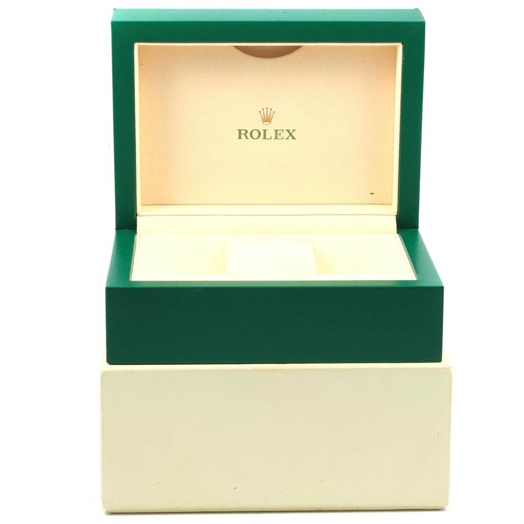 The image shows the open, empty green and beige box for a Rolex Submariner 114060 Men's Stainless Steel Black Dial 114060 Men's Stainless Steel Black Dial watch, displaying the brand logo inside the lid.