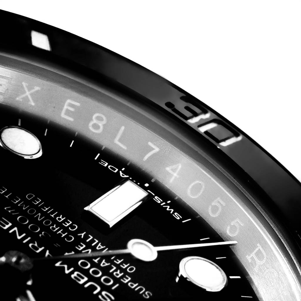 The image shows a close-up angle of the dial and bezel of the Rolex Submariner 114060 Men's Stainless Steel Black Dial 114060 Men's Stainless Steel Black Dial watch, highlighting the numerals and text details.
