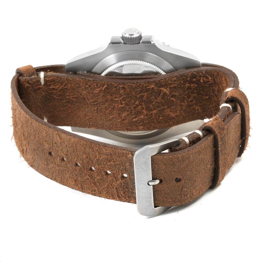 This image shows the back view of a Rolex Submariner 114060 Men's Stainless Steel Black Dial 114060 Men's Stainless Steel Black Dial watch, with a brown leather strap and a visible clasp.