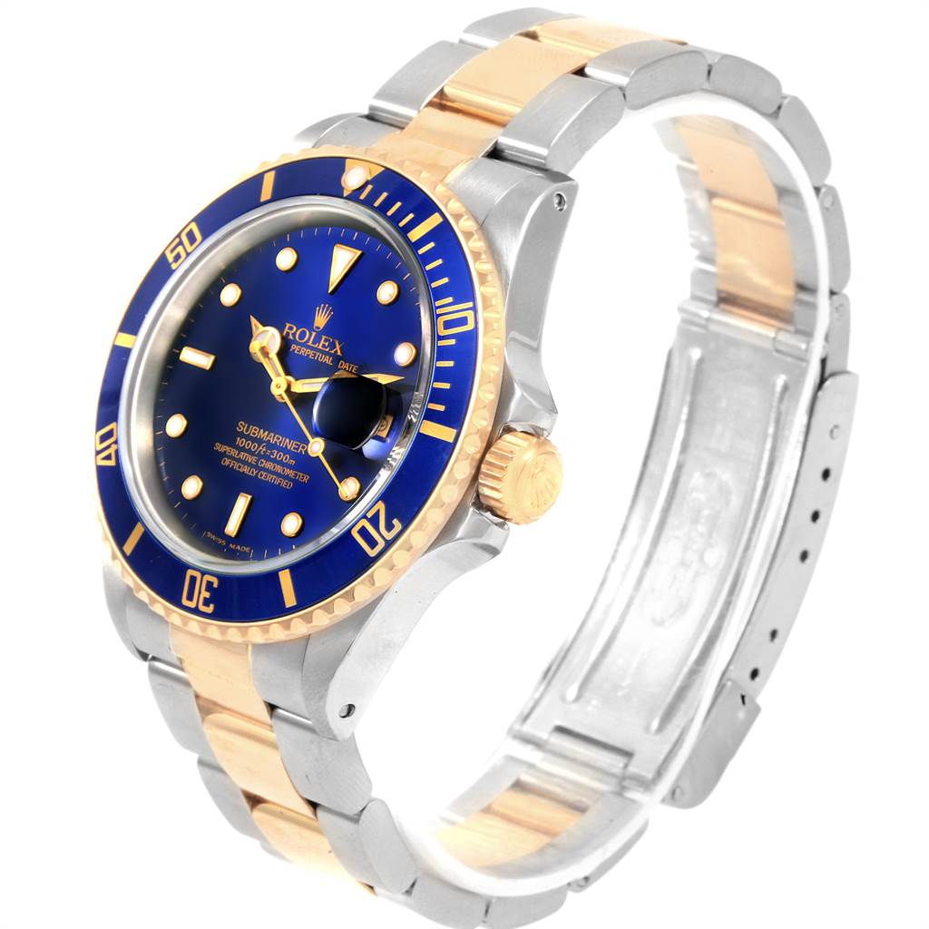 The Rolex Submariner 16613 Men's Steel and Gold (two tone) Blue Dial 16613 Men's Steel and Gold (two tone) Blue Dial watch is shown from an angled front view, highlighting its blue dial, bezel, and two-tone bracelet.