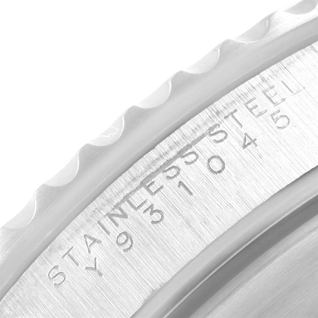 The image shows a close-up view of the case and serrated bezel, highlighting the serial number engraving on a Rolex Submariner 14060 Men's Stainless Steel Black Dial 14060 Men's Stainless Steel Black Dial watch.