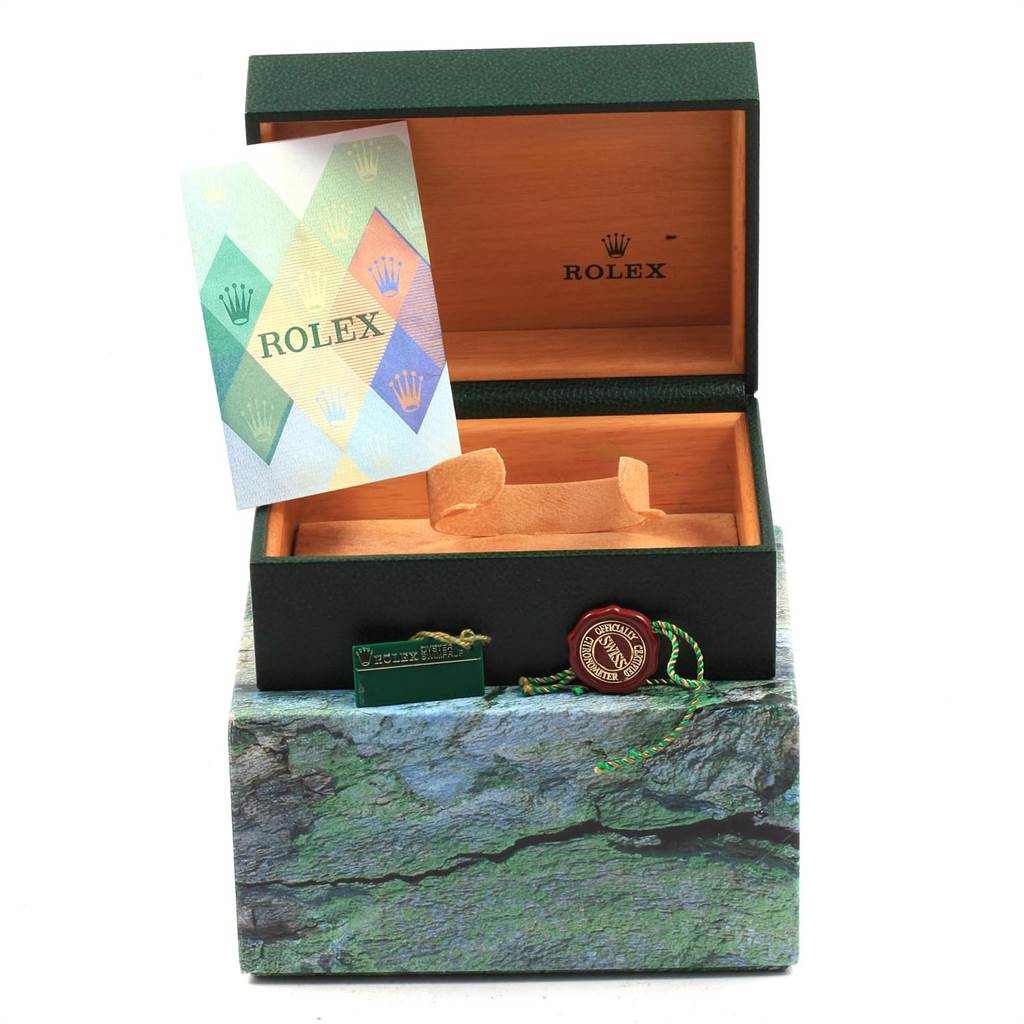 The image shows an open Rolex Submariner 14060 Men's Stainless Steel Black Dial 14060 Men's Stainless Steel Black Dial watch box with a warranty card and tags inside.