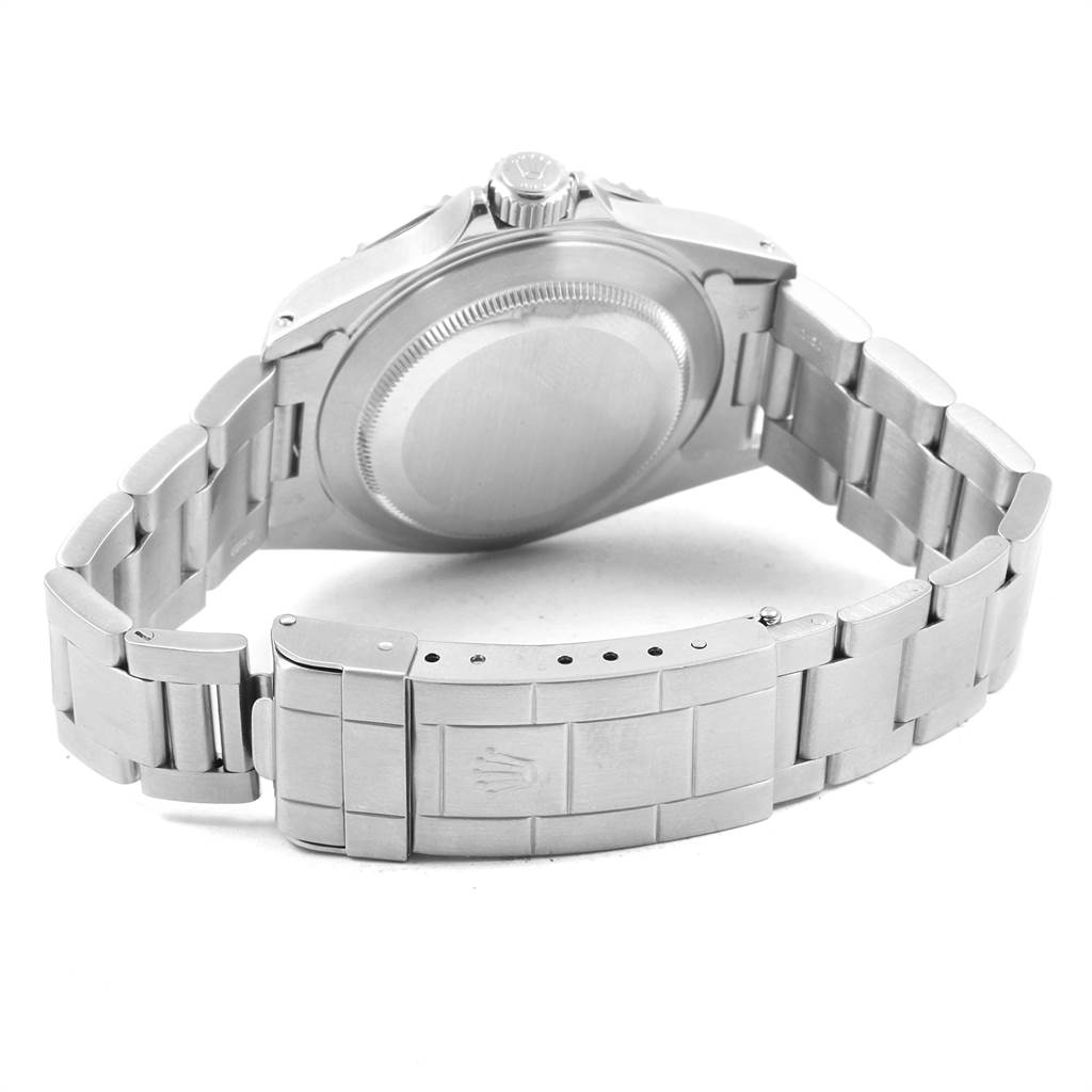 This image shows the backside and bracelet of a Rolex Submariner 14060 Men's Stainless Steel Black Dial 14060 Men's Stainless Steel Black Dial watch, including the case back and clasp with the Rolex logo.