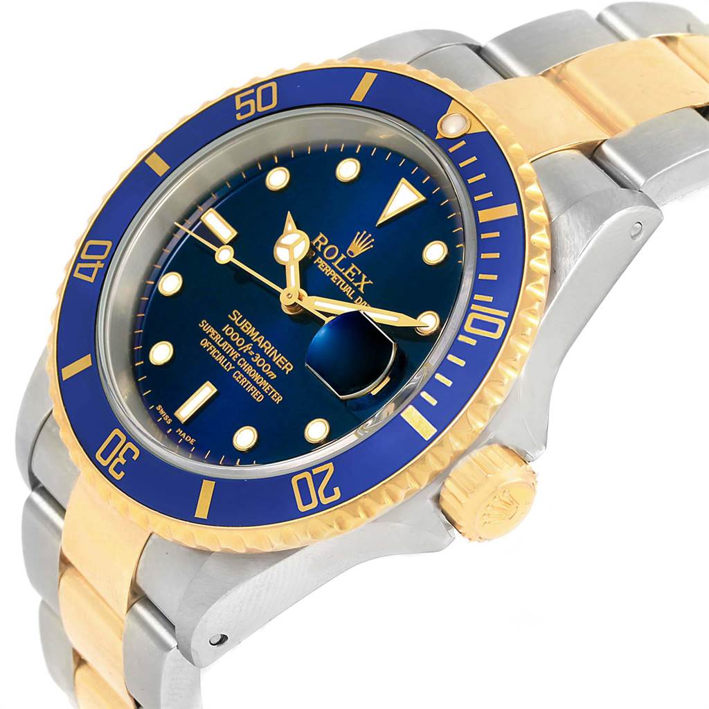 This image shows a Rolex Submariner 16613 Men's Steel and Gold (two tone) Blue Dial 16613 Men's Steel and Gold (two tone) Blue Dial watch angled from the top right, highlighting its blue dial, bezel, and two-tone bracelet.