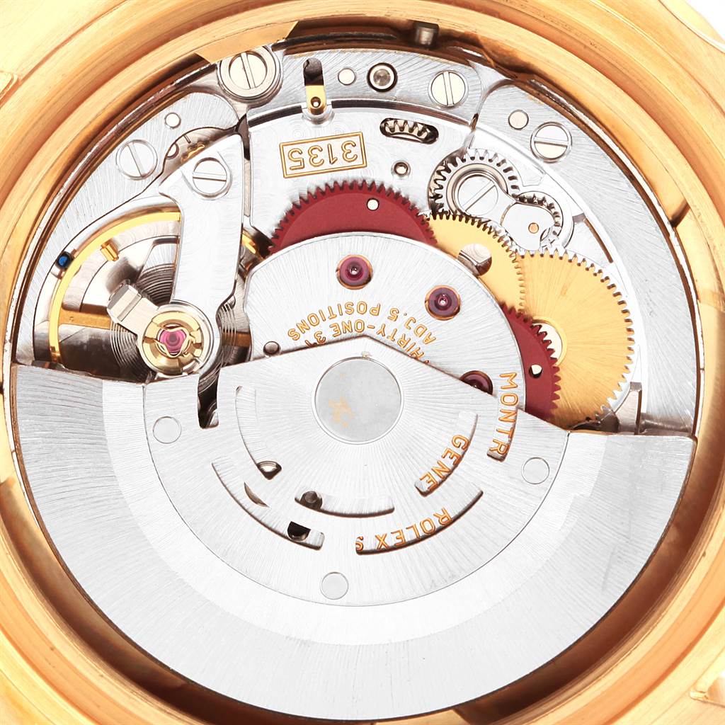 This image shows the intricate internal mechanical movement of a Rolex Submariner 16618 Men's Yellow Gold Blue Dial 16618 Men's Yellow Gold Blue Dial watch, viewed from the back.