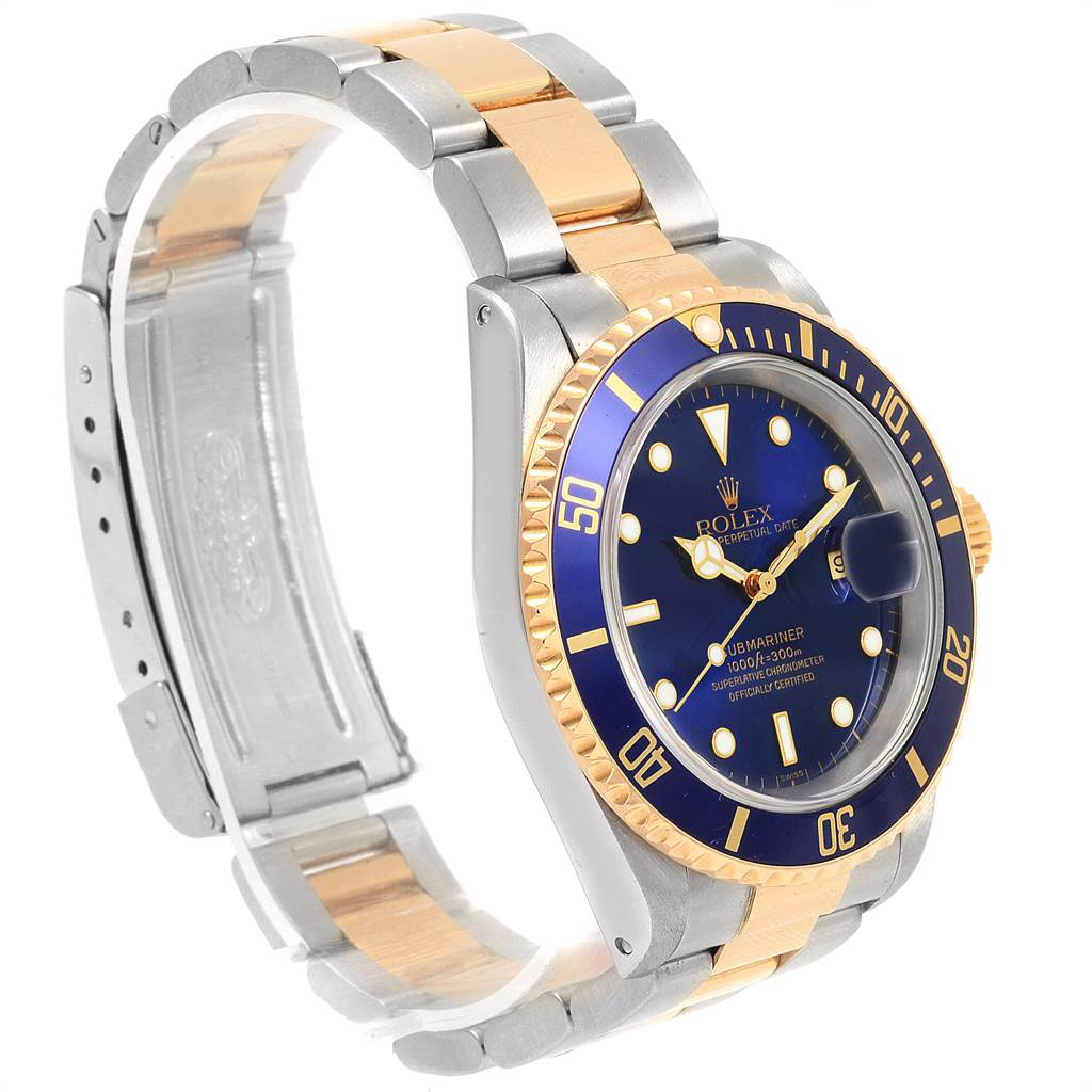 This image shows a side angle of a Rolex Submariner 16613 Men's Steel and Gold (two tone) Blue Dial 16613 Men's Steel and Gold (two tone) Blue Dial watch, highlighting its blue dial, bezel, and two-tone bracelet.