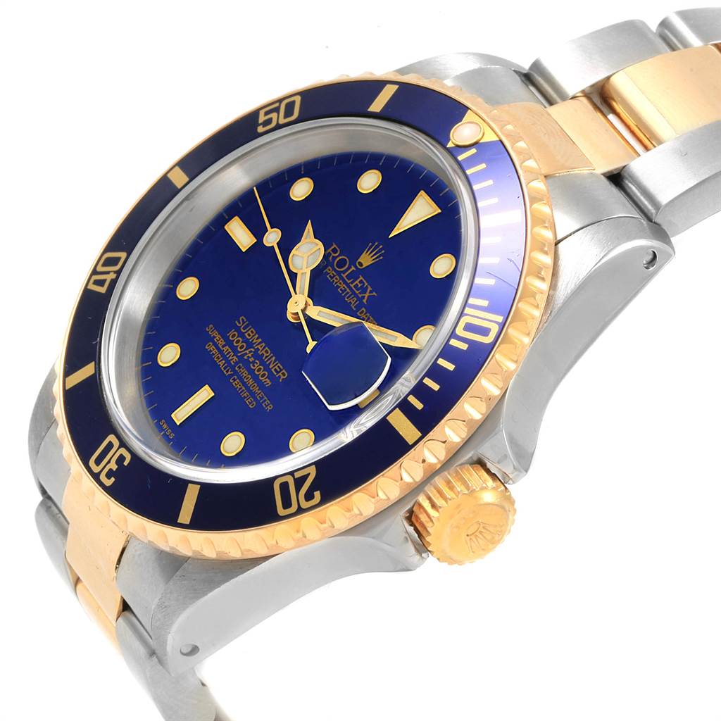 The image shows a Rolex Submariner 16613 Men's Steel and Gold (two tone) Blue Dial 16613 Men's Steel and Gold (two tone) Blue Dial watch at a slight angle, highlighting the crown, bezel, dial, and bracelet.