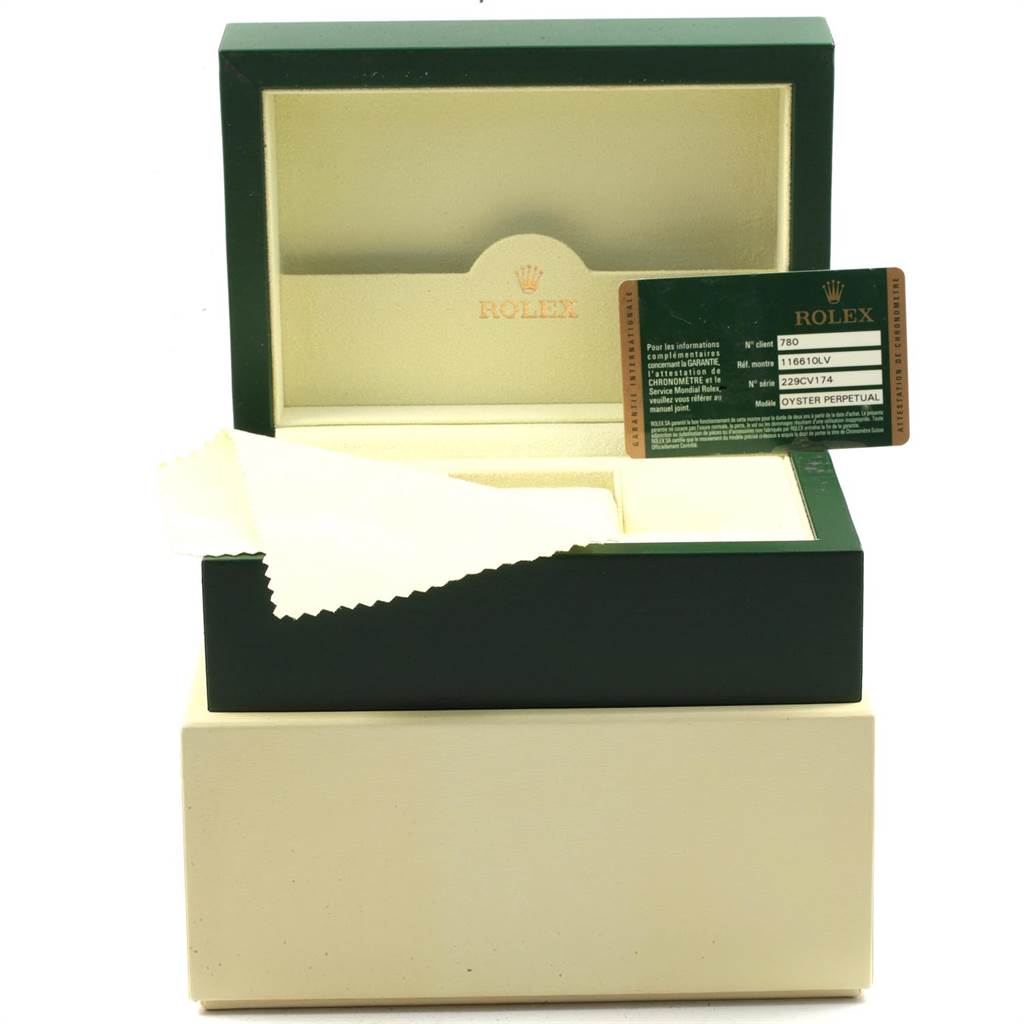 The image shows an open Rolex Submariner 116610LV Men's Stainless Steel Green Dial 116610LV Men's Stainless Steel Green Dial watch box with a cleaning cloth and a card, viewed from the front.