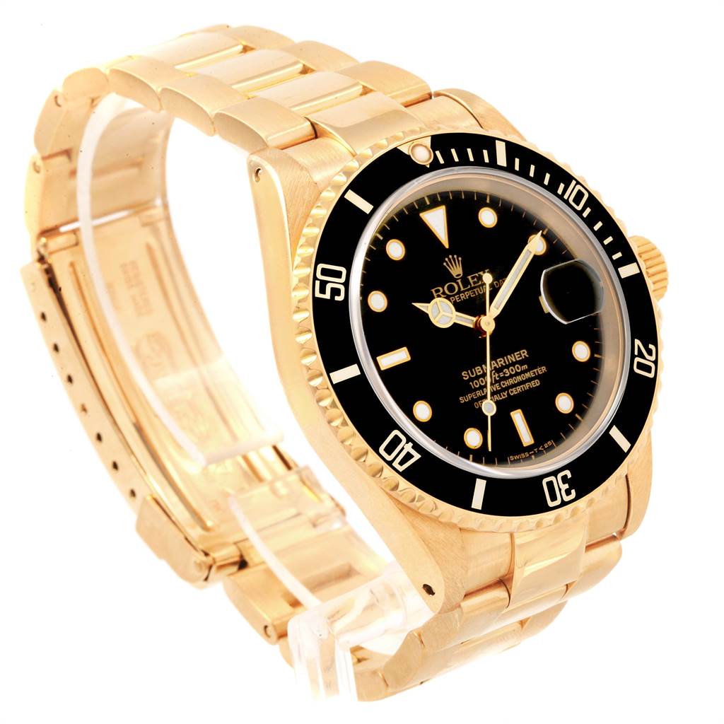The image shows a side-angle view of a Rolex Submariner 16618 Men's Yellow Gold Black Dial 16618 Men's Yellow Gold Black Dial watch, displaying the face, bezel, crown, and part of the gold bracelet.