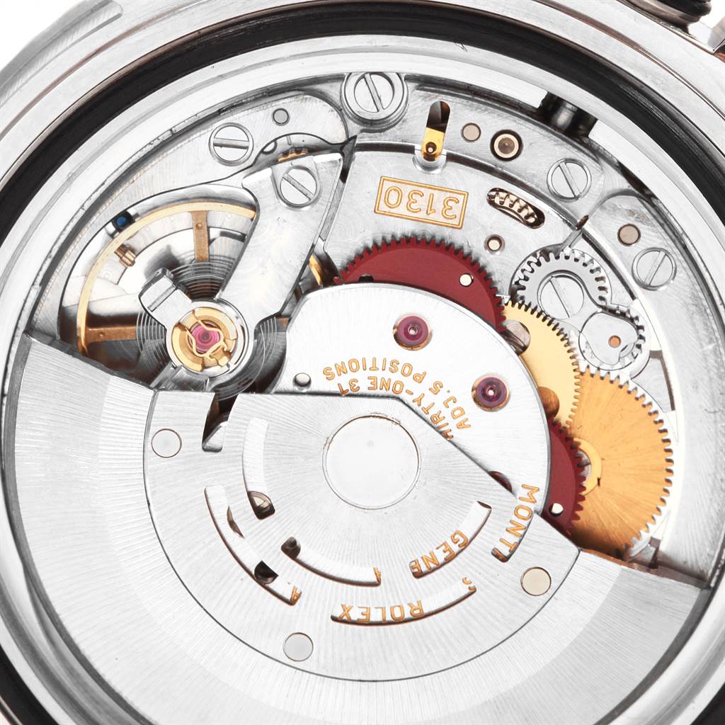 This image shows the intricate inner mechanical workings of a Rolex Submariner 14060 Men's Stainless Steel Black Dial 14060 Men's Stainless Steel Black Dial watch, viewed from the back.