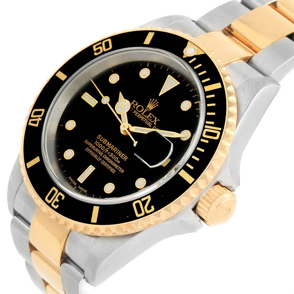 The image shows a side-angle view of the Rolex Submariner 16613 Men's Steel and Gold (two tone) Black Dial 16613 Men's Steel and Gold (two tone) Black Dial, focusing on the dial, bezel, and part of the bracelet.