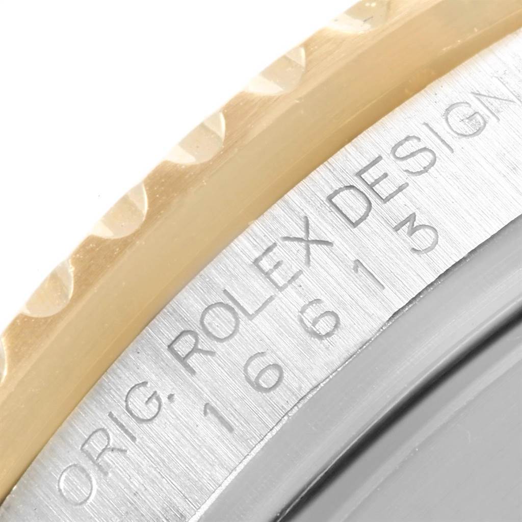 The image shows a close-up of the bezel and case side of a Rolex Submariner 16613 Men's Steel and Gold (two tone) Champagne Dial 16613 Men's Steel and Gold (two tone) Champagne Dial watch, featuring the model number 16613.