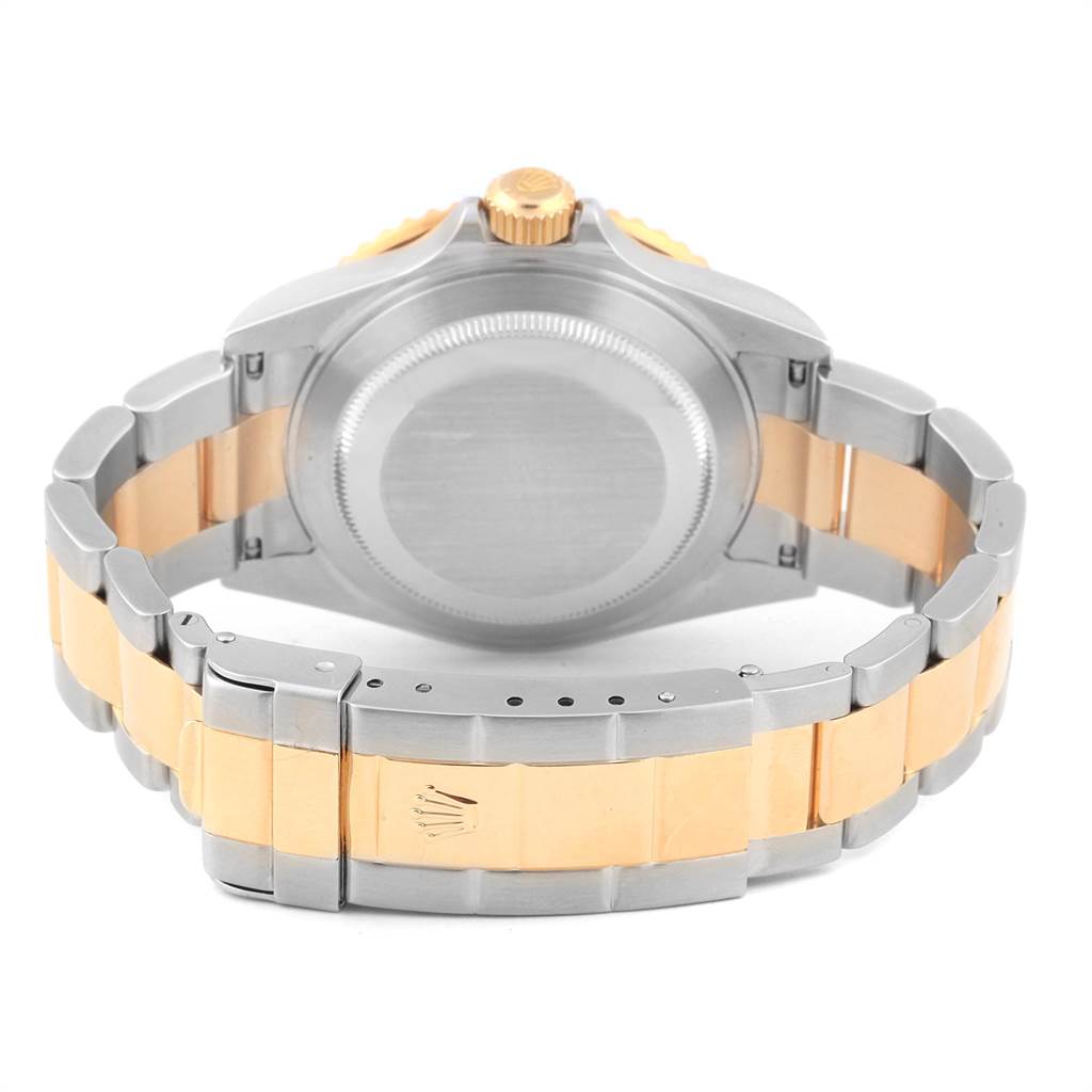 The image shows the back view of a Rolex Submariner 16613 Men's Steel and Gold (two tone) Grey Dial 16613 Men's Steel and Gold (two tone) Grey Dial, highlighting the bracelet and case back.