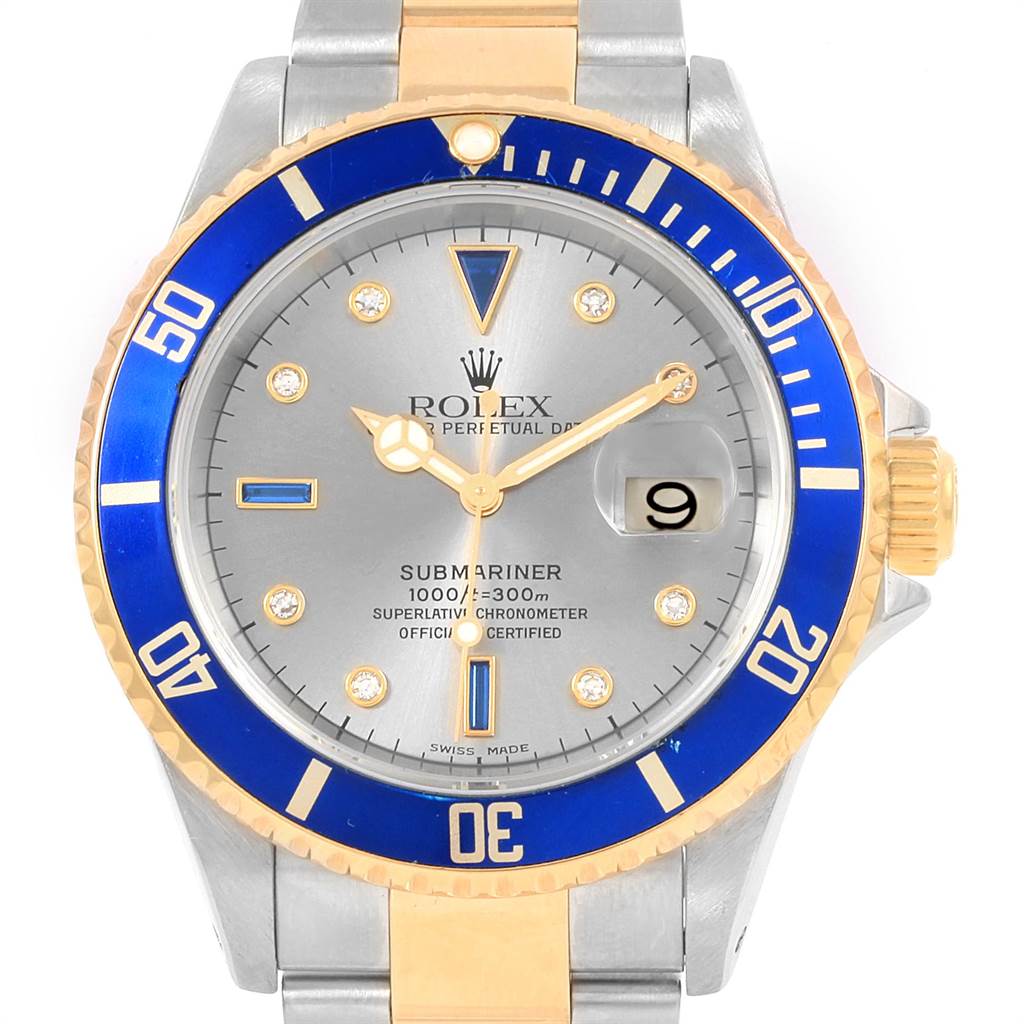 The image shows a Rolex Submariner 16613 Men's Steel and Gold (two tone) Grey Dial 16613 Men's Steel and Gold (two tone) Grey Dial watch from a top-down angle, displaying its face, bezel, and part of the bracelet.