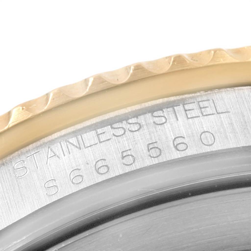 This close-up image shows the side view of the case back engraving on a Rolex Submariner 16613 Men's Steel and Gold (two tone) Blue Dial 16613 Men's Steel and Gold (two tone) Blue Dial, highlighting the stainless steel marking.
