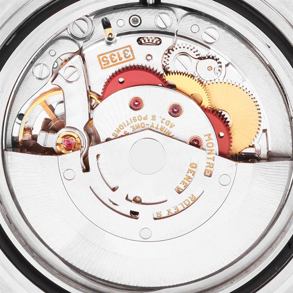 This image shows the internal movement mechanism of a Rolex Submariner 16613 Men's Steel and Gold (two tone) Blue Dial 16613 Men's Steel and Gold (two tone) Blue Dial watch viewed from the back.