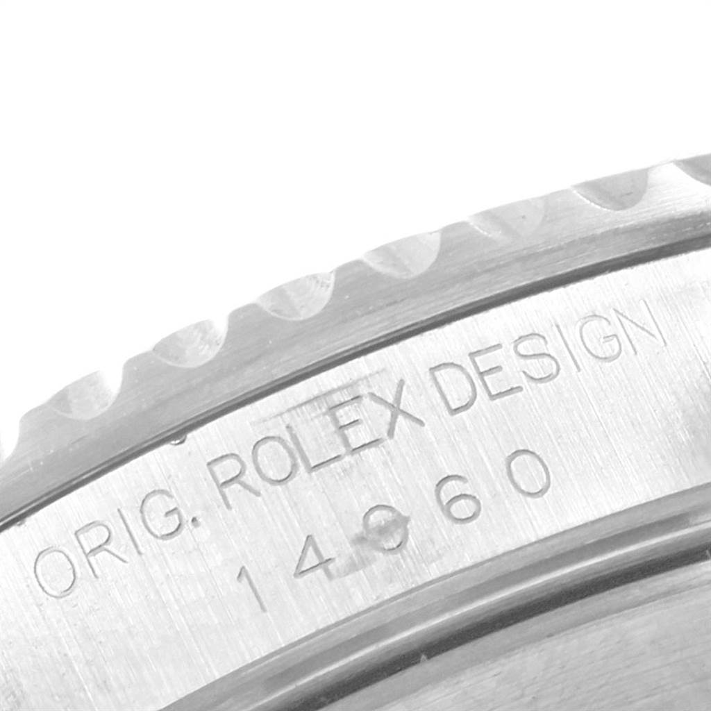 The image shows a close-up view of the model number and design engraving on the case of the Rolex Submariner 14060 Men's Stainless Steel Black Dial 14060 Men's Stainless Steel Black Dial watch.