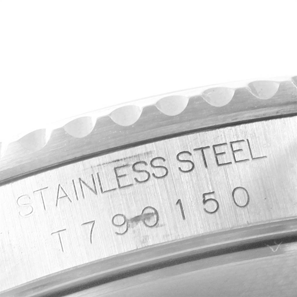 This image shows a close-up of the case-back edge of a Rolex Submariner 14060 Men's Stainless Steel Black Dial 14060 Men's Stainless Steel Black Dial, highlighting the engraved text and serial number.