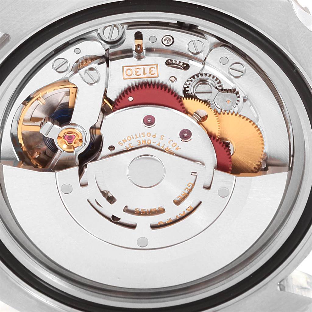 This is a close-up of the internal mechanism of a Rolex Submariner 114060 Men
s Stainless Steel Black Dial 114060 Men
s Stainless Steel Black Dial watch, showing gears and components.