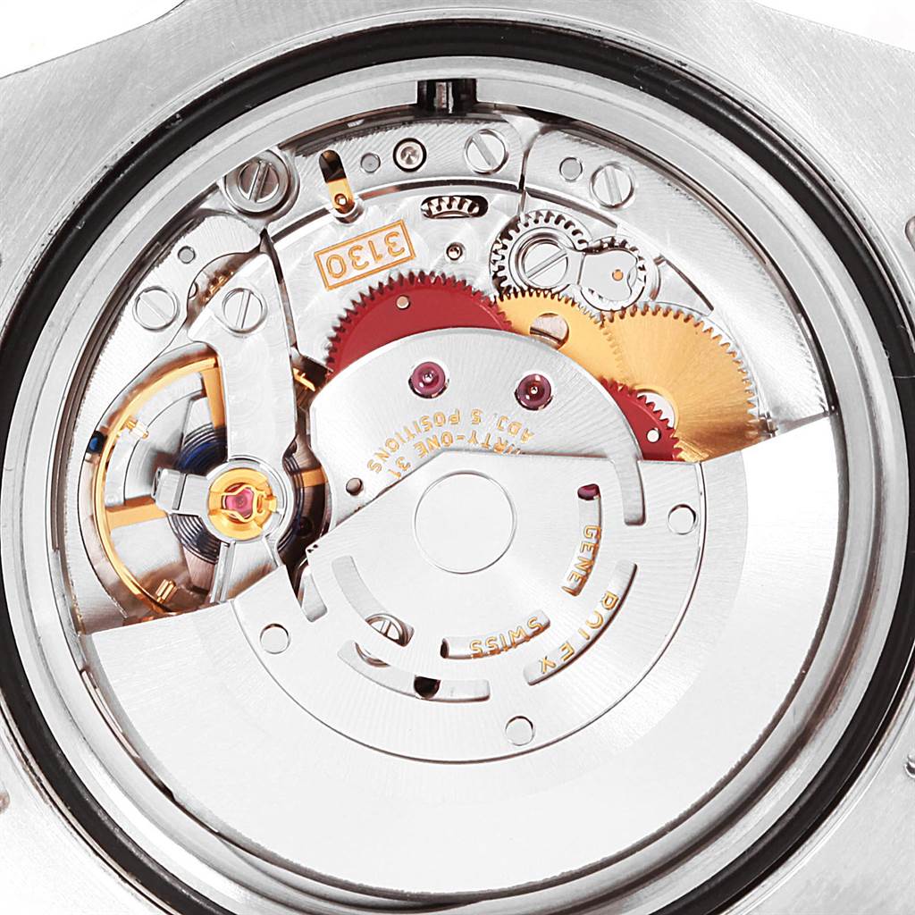 The image shows the intricate internal movement components of a Rolex Submariner 114060 Men
s Stainless Steel Black Dial 114060 Men
s Stainless Steel Black Dial watch from a close-up, rear angle.