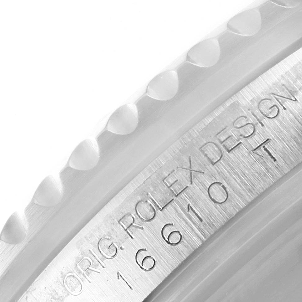 The image shows a close-up of the engraved bezel and case edge of a Rolex Submariner 16610 Men's Stainless Steel Black Dial 16610 Men's Stainless Steel Black Dial, displaying the model number.