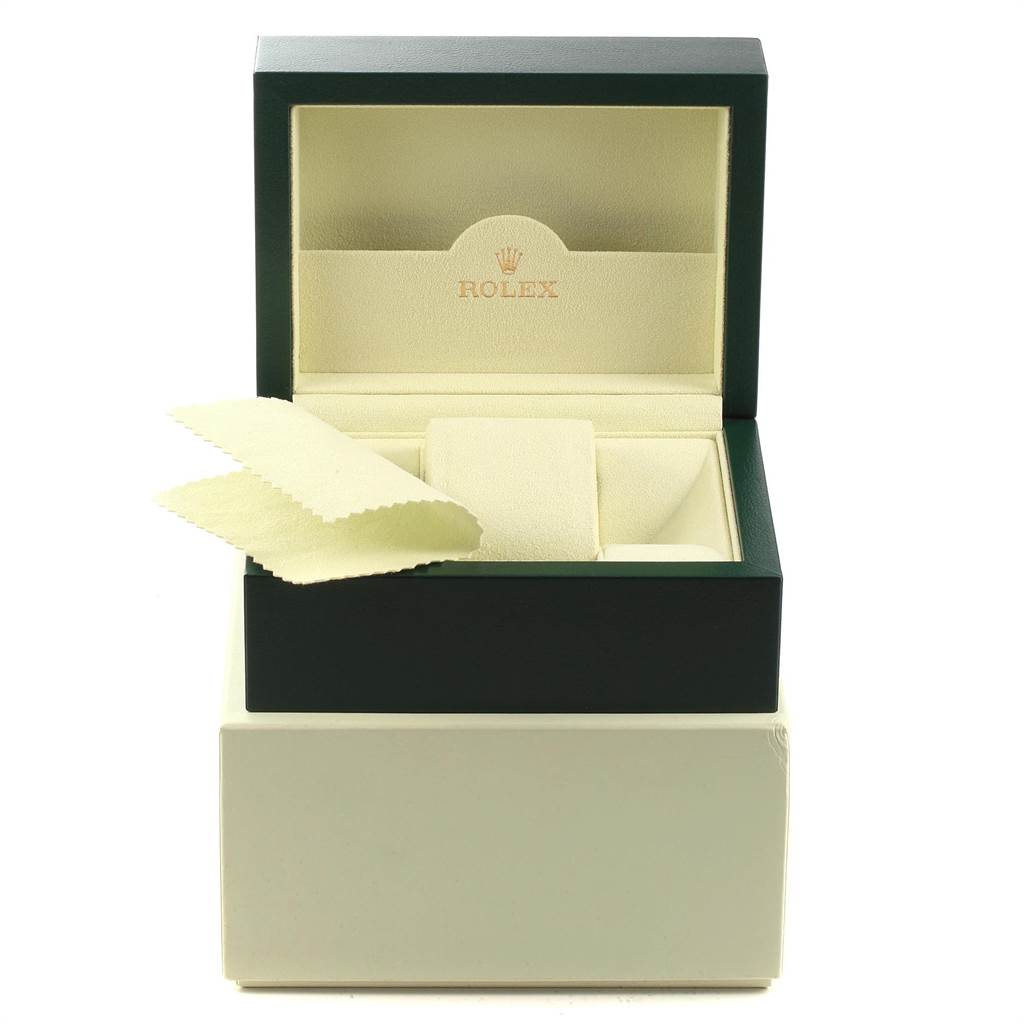 The image shows the open box and cleaning cloth for the Rolex Submariner 16610 Men's Stainless Steel Black Dial 16610 Men's Stainless Steel Black Dial watch model.