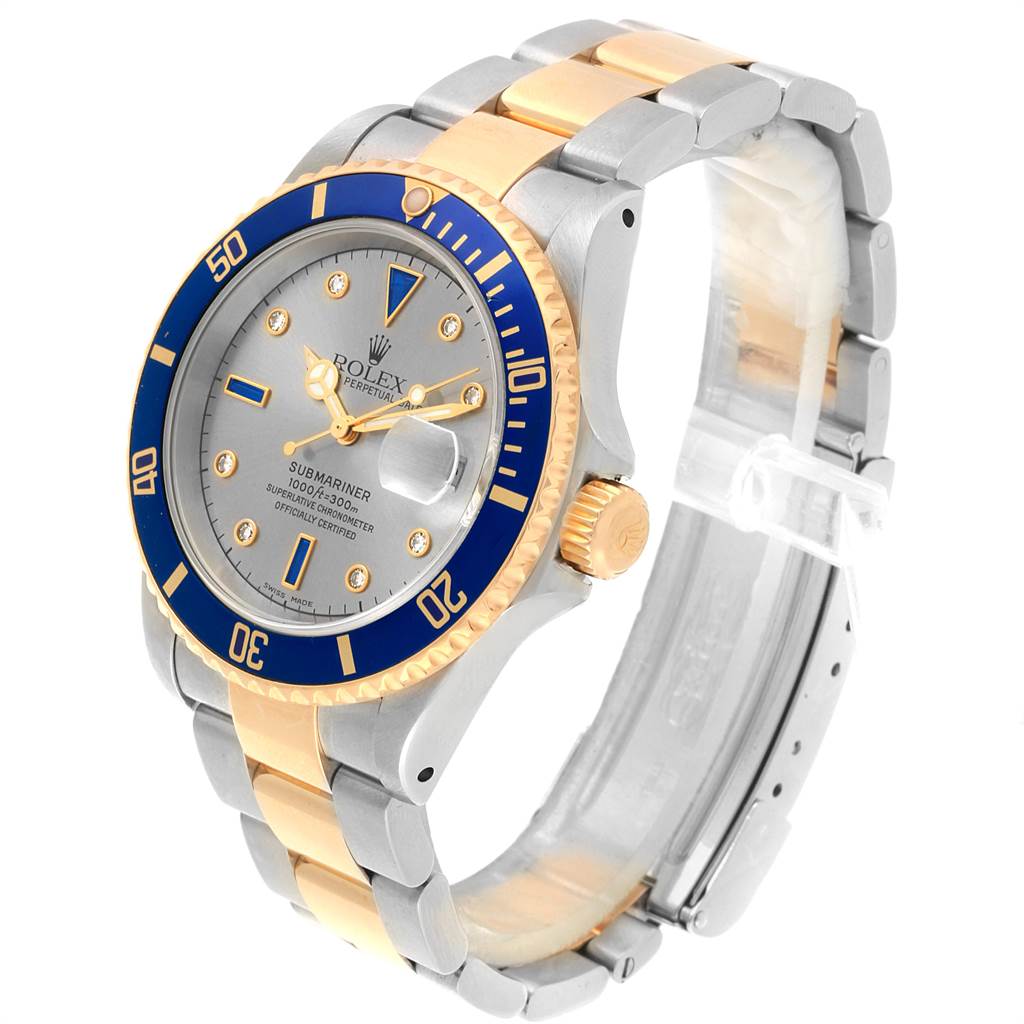 The Rolex Submariner 16613 Men's Steel and Gold (two tone) Grey Dial 16613 Men's Steel and Gold (two tone) Grey Dial watch is shown at a slight angle, displaying the face, bezel, crown, and bi-tone strap.