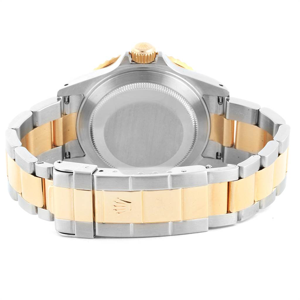 This image shows the back case and bracelet of a Rolex Submariner 16613 Men's Steel and Gold (two tone) Grey Dial 16613 Men's Steel and Gold (two tone) Grey Dial watch from a rear view angle.