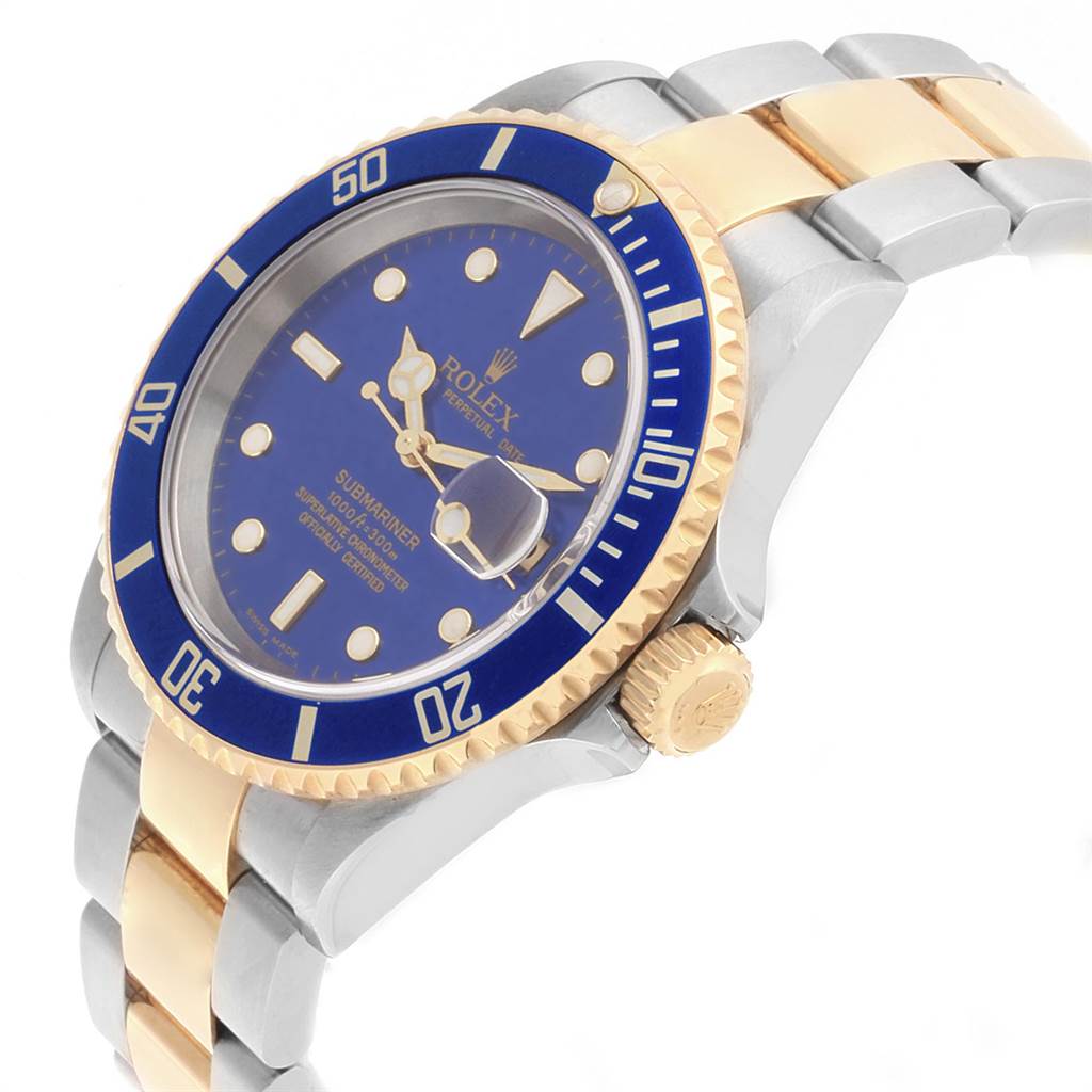 This image shows a side angle of a Rolex Submariner 16613 Men's Steel and Gold (two tone) Blue Dial 16613 Men's Steel and Gold (two tone) Blue Dial watch, highlighting its blue dial, gold bezel, and two-tone bracelet.