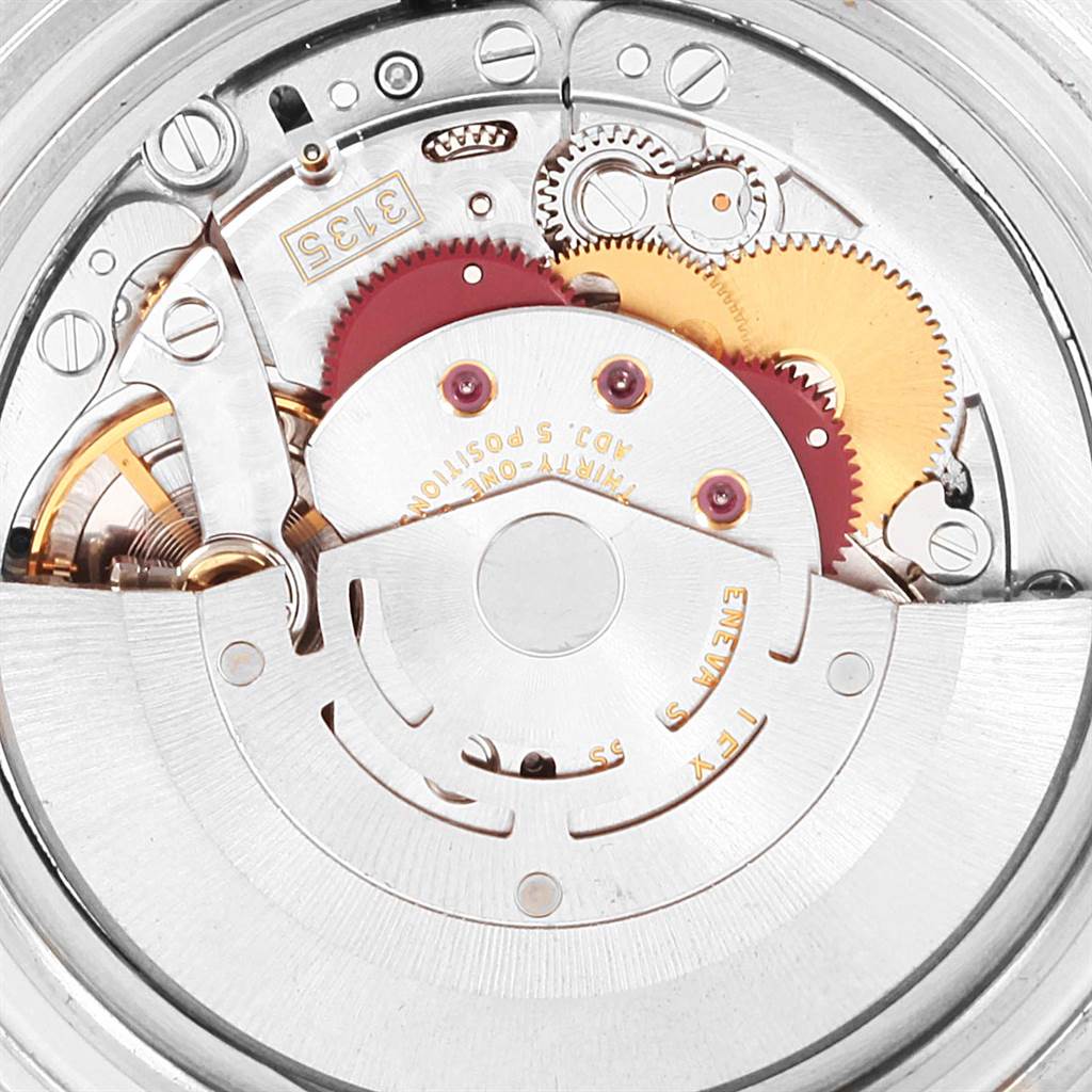 This image shows the internal mechanism of the Rolex Submariner 16613 Men's Steel and Gold (two tone) Blue Dial 16613 Men's Steel and Gold (two tone) Blue Dial watch from a top-down angle.