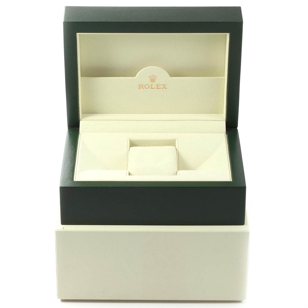 The image shows an open Rolex Submariner 14060 Men's Stainless Steel Black Dial 14060 Men's Stainless Steel Black Dial watch box, displaying its interior cushion and branding.