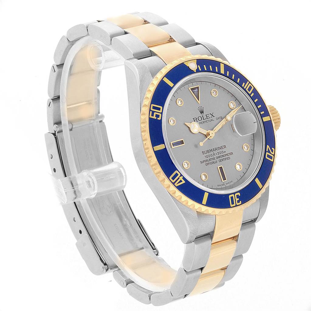 This is a side view of the Rolex Submariner 16613 Men's Steel and Gold (two tone) Grey Dial 16613 Men's Steel and Gold (two tone) Grey Dial, showing the face, bracelet, and part of the clasp.