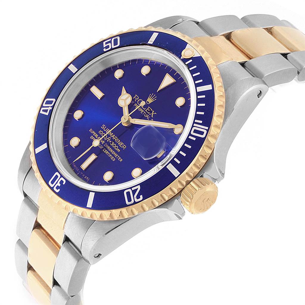 The image shows a Rolex Submariner 16613 Men's Steel and Gold (two tone) Blue Dial 16613 Men's Steel and Gold (two tone) Blue Dial watch at an angled view, highlighting the dial, bezel, bracelet, and crown.