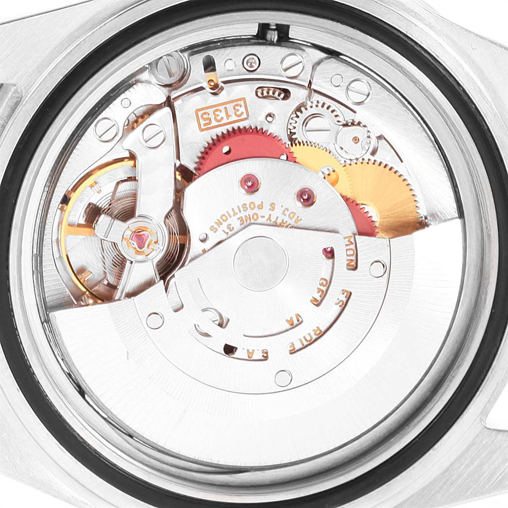 This image shows a close-up angle of the Rolex Submariner 16613 Men's Steel and Gold (two tone) Blue Dial 16613 Men's Steel and Gold (two tone) Blue Dial watch's inner mechanical movement.