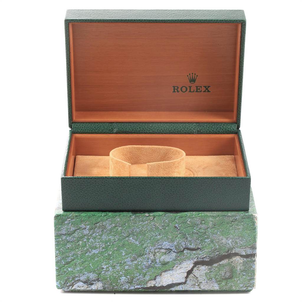 A Rolex Submariner 16613 Men's Steel and Gold (two tone) Blue Dial 16613 Men's Steel and Gold (two tone) Blue Dial box is shown from a front angle, displaying the interior with a cushion and the lid open.