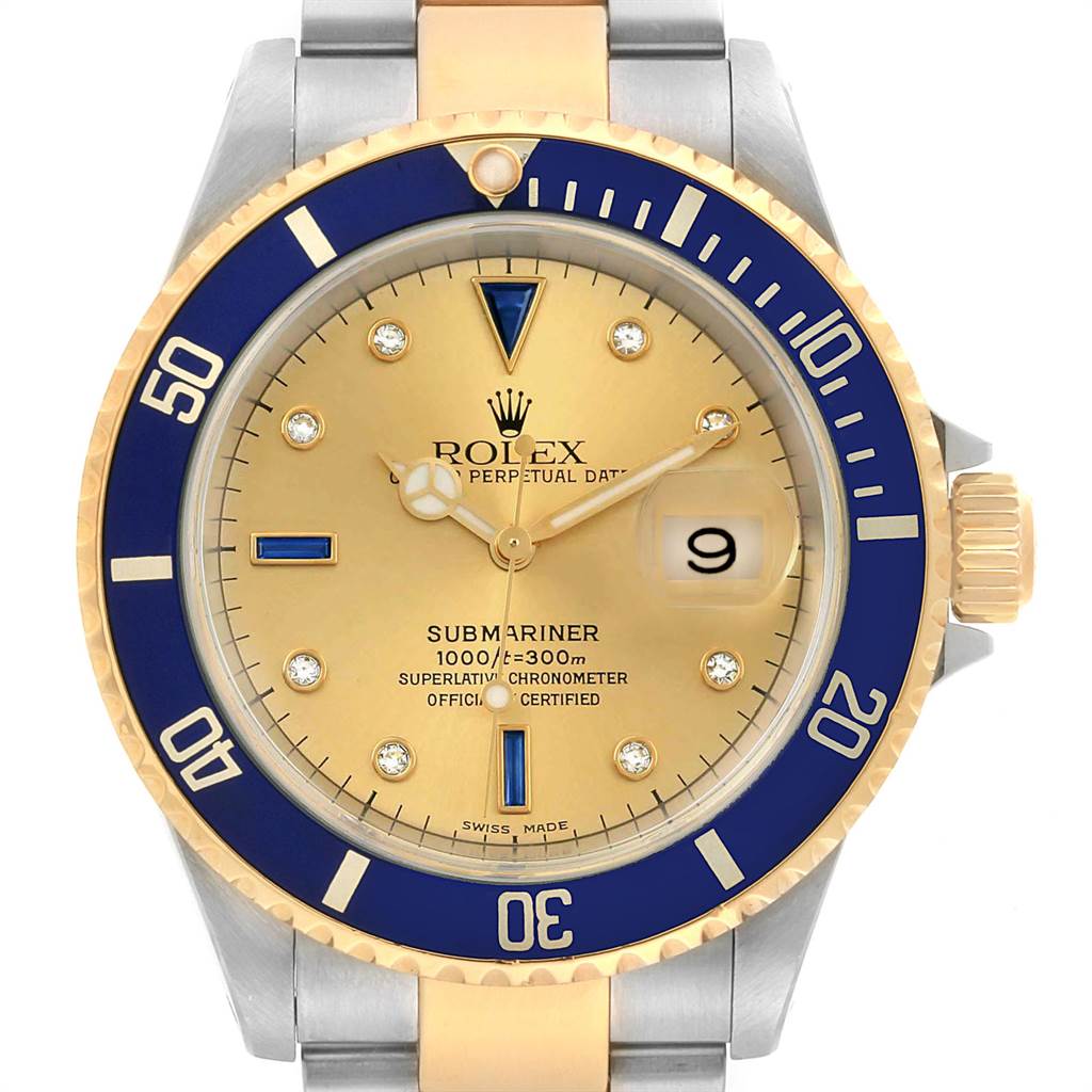 This image shows a front view of a Rolex Submariner 16613 Men
s Steel and Gold (two tone) Champagne Dial 16613 Men
s Steel and Gold (two tone) Champagne Dial watch, displaying the dial, bezel, and part of the bracelet.