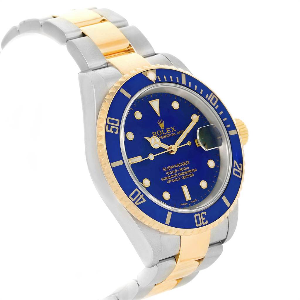This image shows a Rolex Submariner 16613 Men's Steel and Gold (two tone) Blue Dial 16613 Men's Steel and Gold (two tone) Blue Dial watch at an angle, highlighting its blue dial, bezel, and two-tone bracelet.