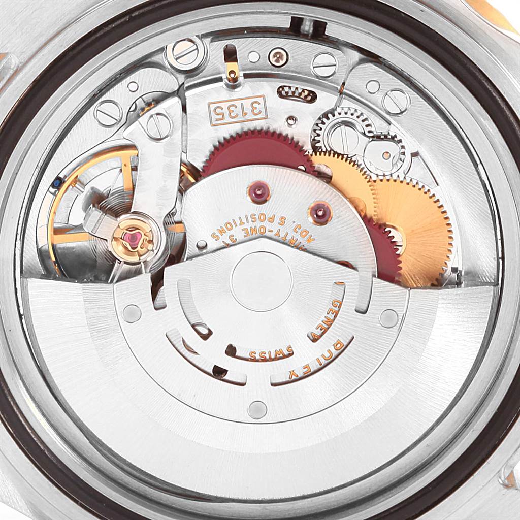 This image shows the internal movement mechanism parts of the Rolex Submariner 16613 Men's Steel and Gold (two tone) Blue Dial 16613 Men's Steel and Gold (two tone) Blue Dial watch model.