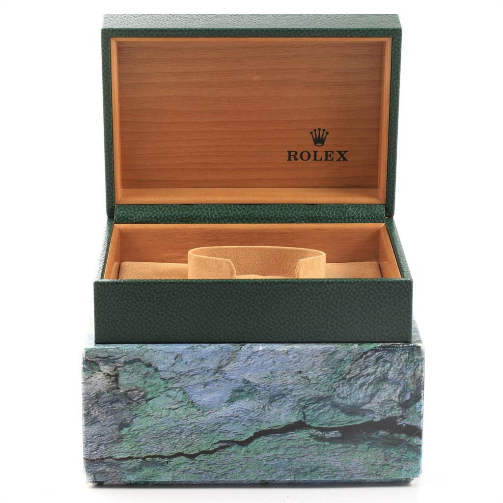 The image shows an open Rolex Submariner 16613 Men's Steel and Gold (two tone) Blue Dial 16613 Men's Steel and Gold (two tone) Blue Dial model watch box, revealing the interior cushion and lining.