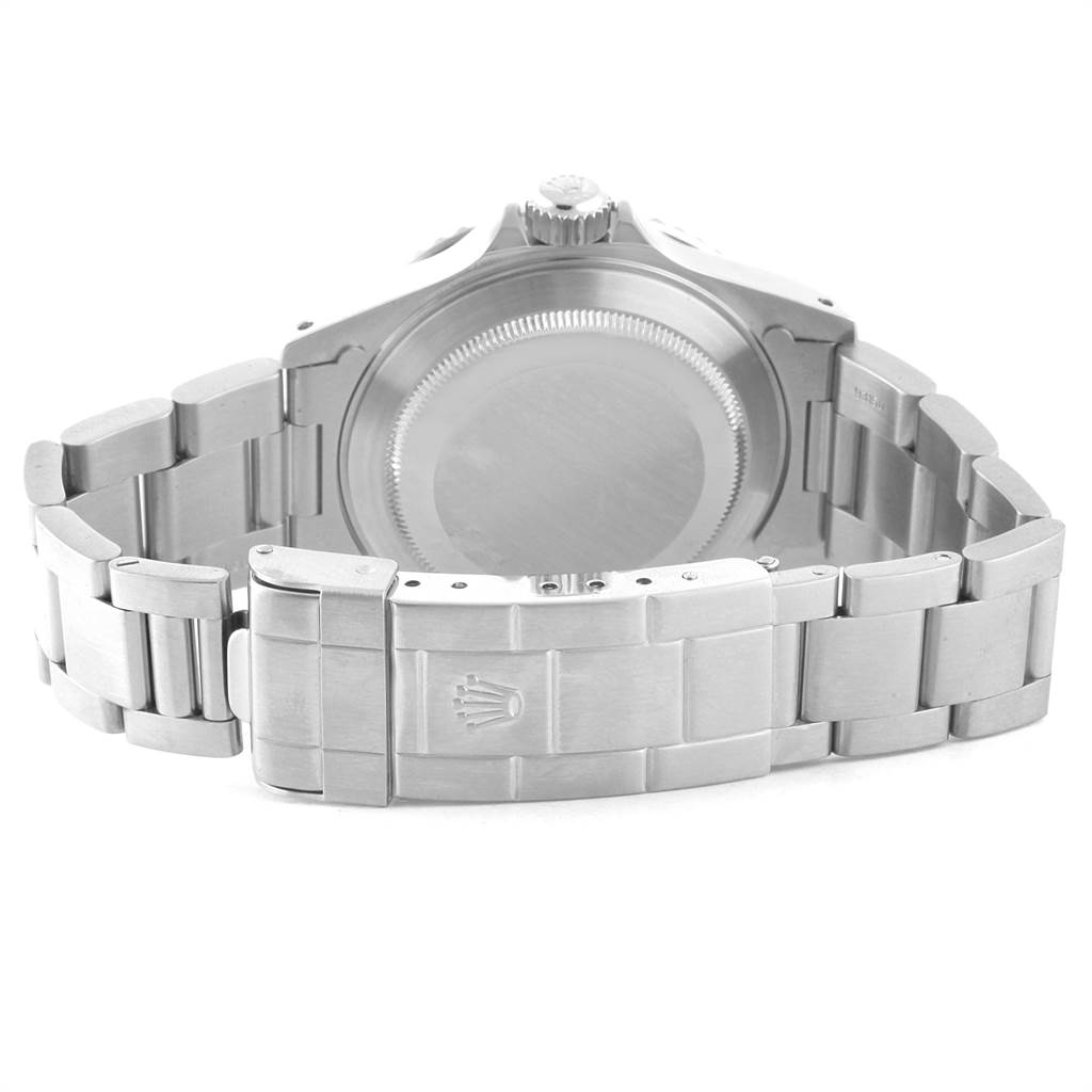 This image shows the back case and metal bracelet clasp of a Rolex Submariner 14060 Men's Stainless Steel Black Dial 14060 Men's Stainless Steel Black Dial watch.