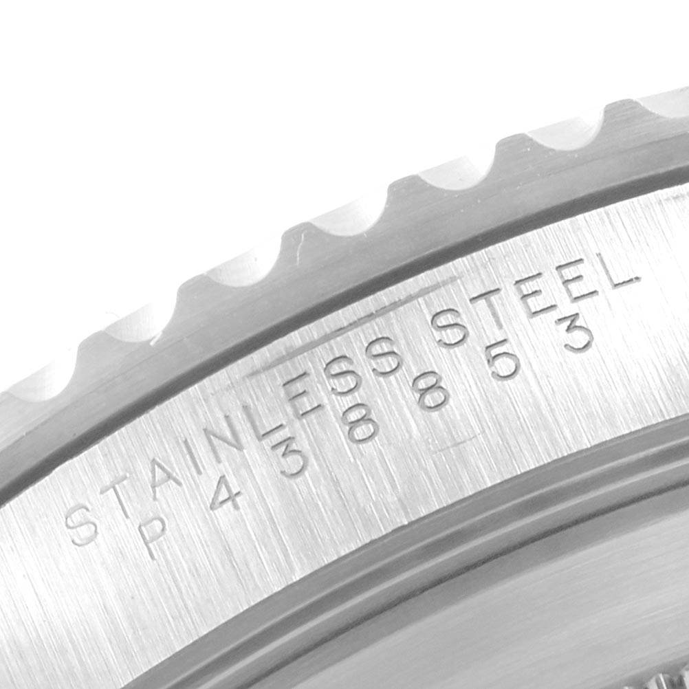 This image shows a close-up of the back case and bezel edge of a Rolex Submariner 14060 Men's Stainless Steel Black Dial 14060 Men's Stainless Steel Black Dial watch, highlighting the "STAINLESS STEEL" engraving.