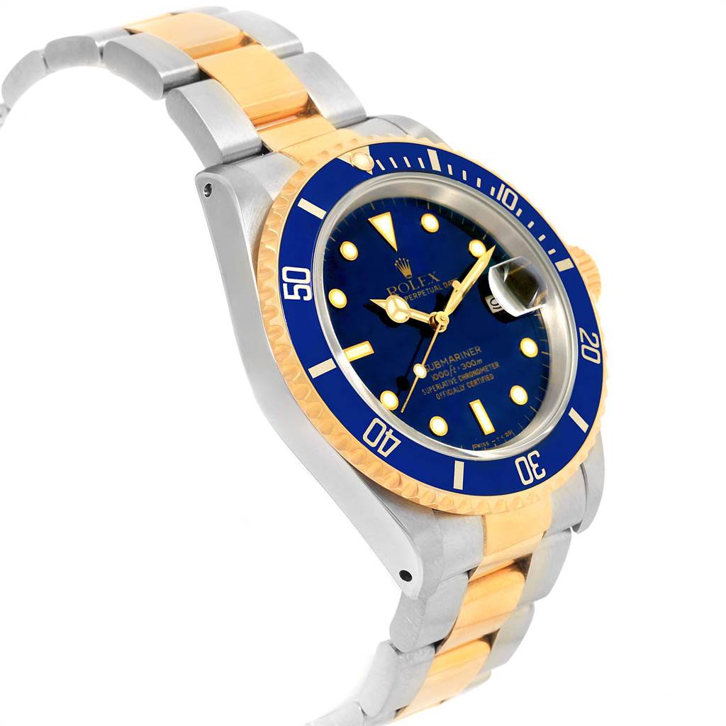 The image shows a Rolex Submariner 16613 Men's Steel and Gold (two tone) Blue Dial 16613 Men's Steel and Gold (two tone) Blue Dial watch at a slight angle, highlighting the bracelet, bezel, and face.