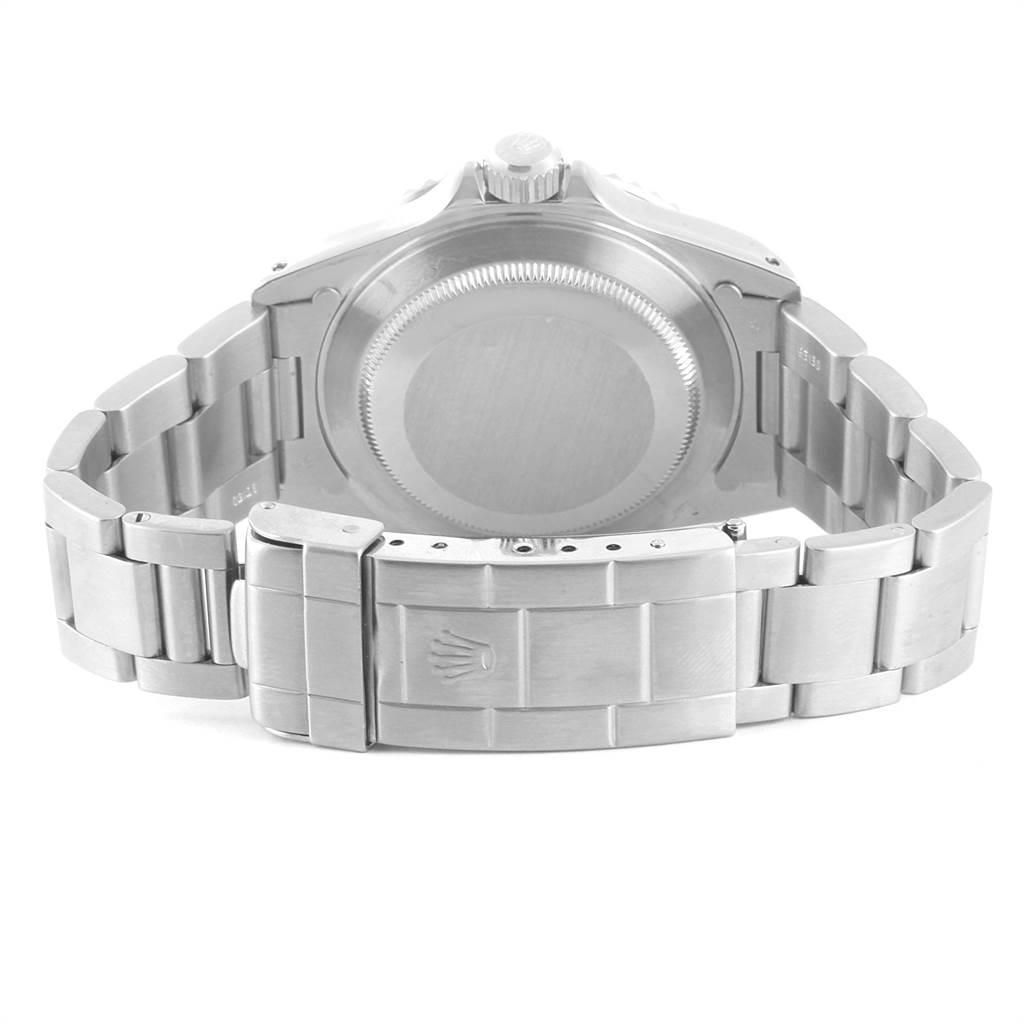 The image shows the back view of a Rolex Submariner 14060 Men's Stainless Steel Black Dial 14060 Men's Stainless Steel Black Dial watch, highlighting its case back and clasp.